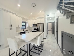 Brand-new 2 Bed + Den Townhouse Trophy Crescent