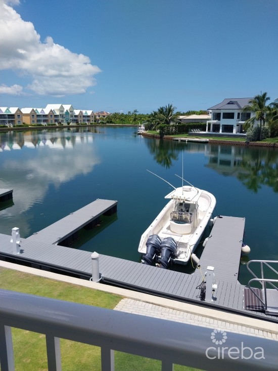 Periwinkle Canal Front 4 Br With Dock And  Double Garage...beautiful!