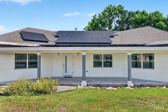 West Bay 2 Bed / 2 Bath Single Family Home With Fenced Yard & Solar Panels